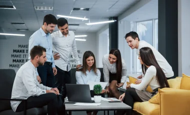 into success. group of young freelancers in the office have conversation and smiling